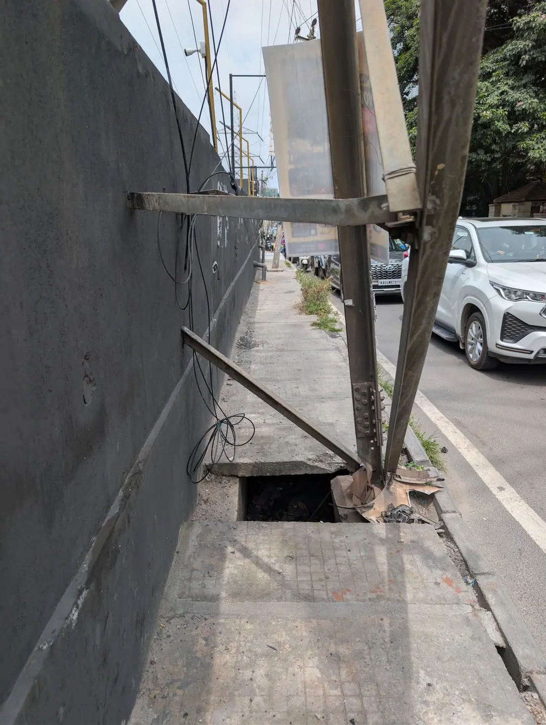A pole planted in an open drain